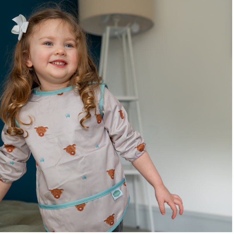 Ziggle Coverall Feeding Bib, Highland Cow